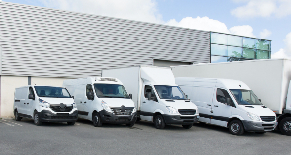 Fleet of white trucks and vans