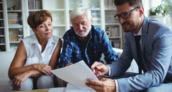 a couple meeting with an ANBTX financial advisor