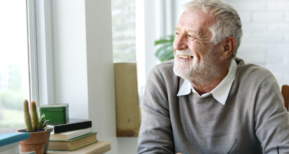 man looking to the future with a smile