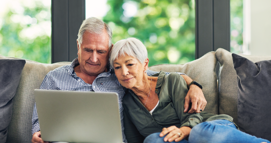 a couple looking at houses