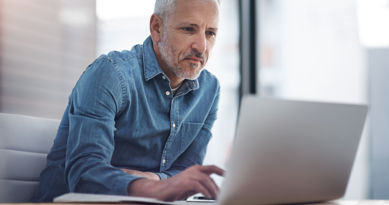 a man opening a DirectPlus checking account with ANBTX