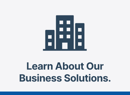 Graphic of blue buildings with text 'Learn about our business solutions.'