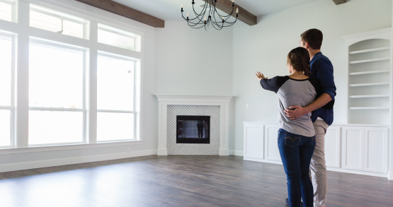 a family looking at new homes