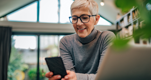 woman managing her account on a phone