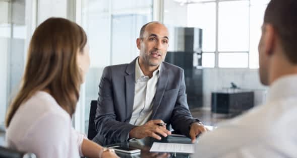 3 people talking about getting a term loan at anbtx